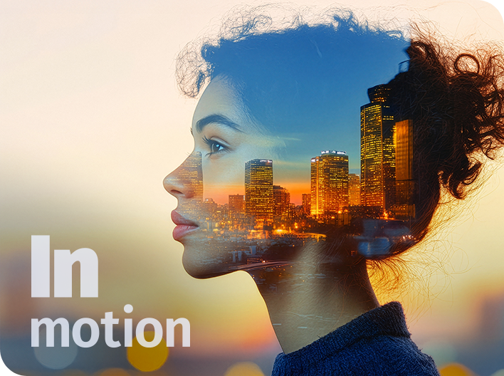 inmotion text with womans side profile with a city scape within