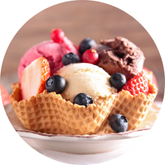Ice cream in a wafer bowl with fruit