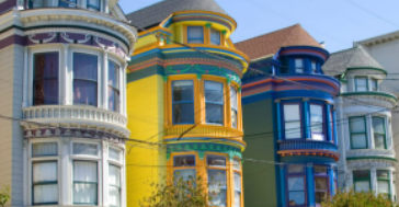 A row of colorful townhouses