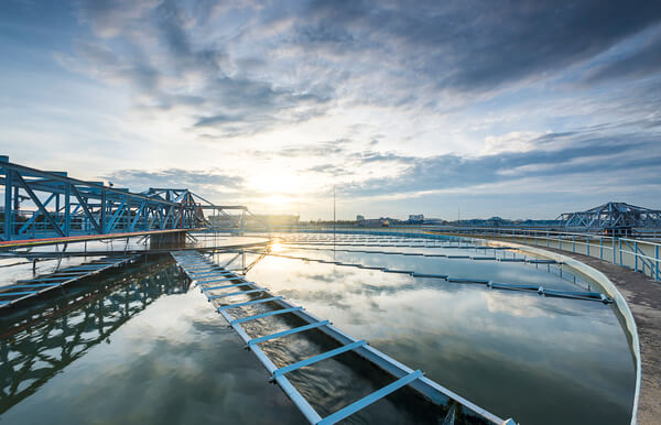 The sun sets over a water treatment plant 