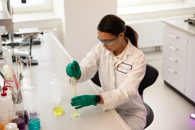 A Univar Solutions scientist in the Esson Solution Center lab working on a formulation