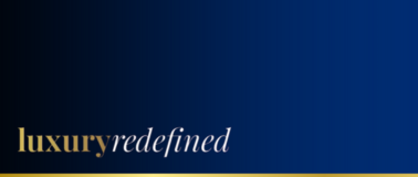 The words "luxury redefined" against a dark blue background