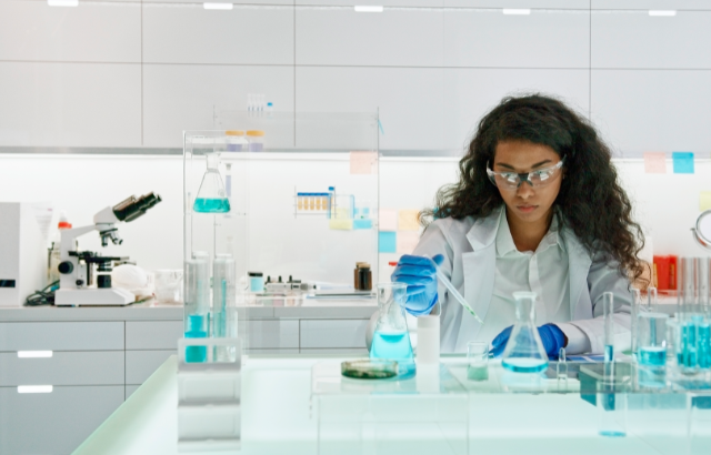 woman working in a lab testing new solutions
