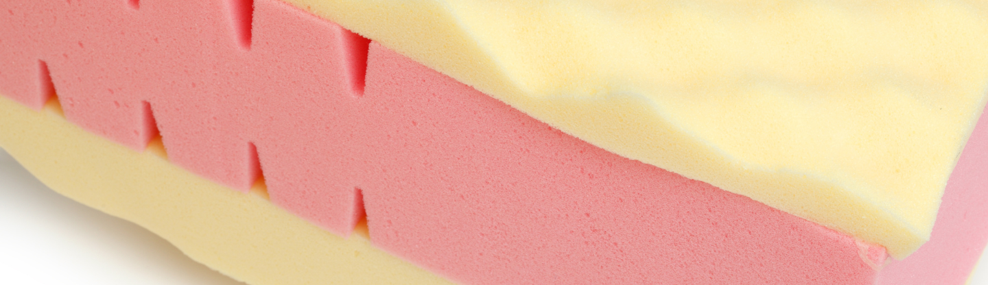 piece of pink and yellow foam 