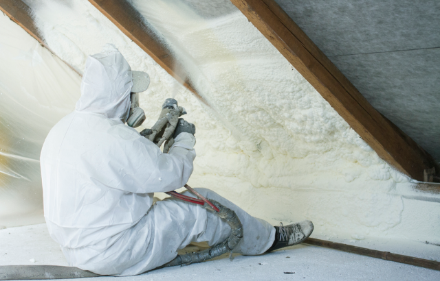 spray foam being applied on a construction site