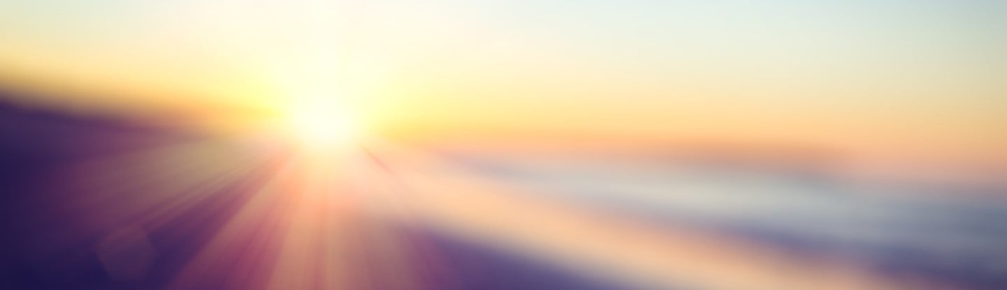 sun peaking through the horizon